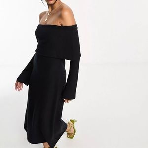 Off should sweater dress with bell sleeves.